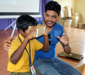 Student experimenting with Google Cardboard at Gokuldem School